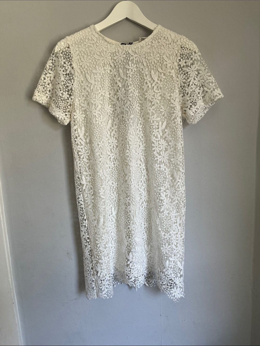 White lace mini dress with short sleeves